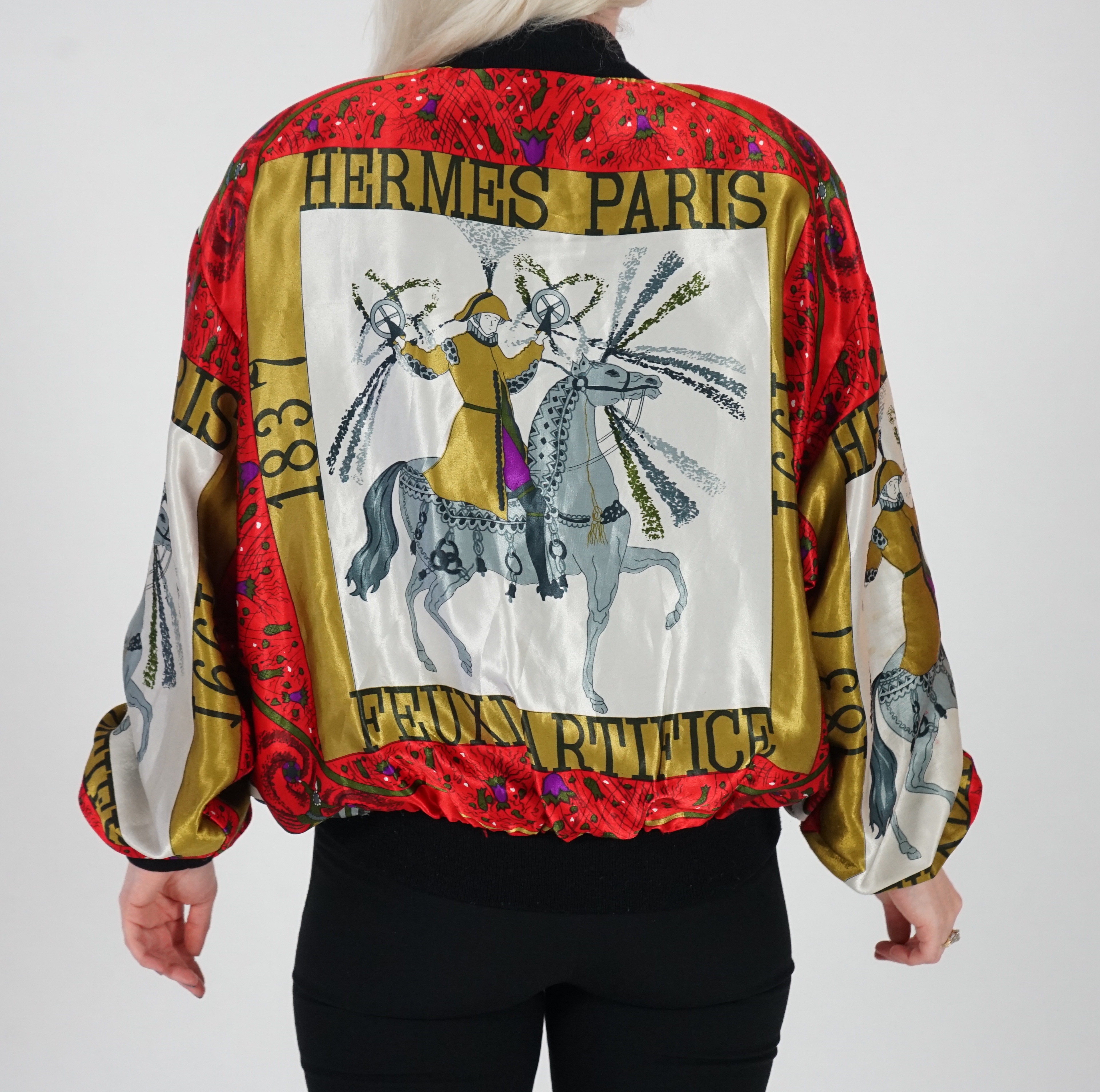 A Hermès silk bomber jacket, chest 137cm (max), waist 101.5cm (max), length 62cm, shoulder 56cm, sleeve 59.5cm